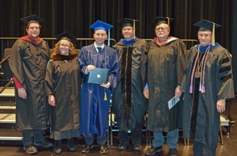 Jake Graduation with faculty